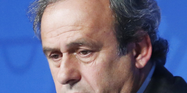 FILE - In this June 10, 2015 file photo UEFA President Michel Platini attends a press conference to mark the one year to go before the start of EURO 2016 soccer tournament in Paris. On Friday, Oct. 9, 2015 file photo FIFA provisionally banned UEFA President Michel Platini for 90 days. (AP Photo/Jacques Brinon)