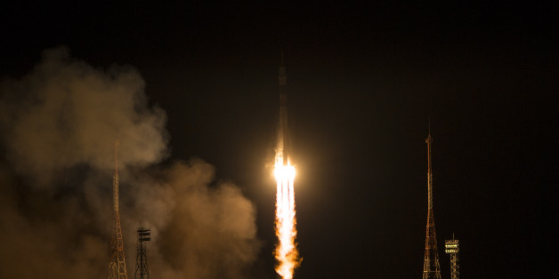 BAIKONUR, KAZAKHSTAN - NOVEMBER 24: In this handout provided by the National Aeronautics and Space Administration (NASA) The Soyuz TMA-15M rocket launches from the Baikonur Cosmodrome November 24, 2014 in Baikonur, Kazakhstan. The Soyuz TMA-15M spacecraft will carry Expedition 42 Soyuz Commander Anton Shkaplerov of the Russian Federal Space Agency (Roscosmos), Flight Engineer Terry Virts of NASA and Flight Engineer Samantha Cristoforetti of the European Space Agency into orbit to begin their five and a half month mission on the International Space Station. (Photo by Aubrey Gemignani/NASA via Getty Images)