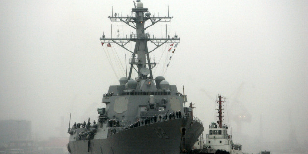 In this April 8, 2008, file photo, guided missile destroyer USS Lassen arrives at the Shanghai International Passenger Quay in Shanghai, China, for a scheduled port visit. Just two days after the USS Lassen sailed past one of China's artificial islands in the South China Sea in a challenge to Chinese sovereignty claims, Defense Ministry spokesman Col. Yang Yujun said Thursday that China will take "all necessary" measures in response to any future U.S. Navy incursions into what it considers its territorial waters around the islands. (AP Photo/Eugene Hoshiko, File)