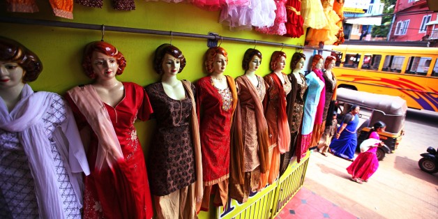 TRIVANDRUM, INDIA - DECEMBER 22: Shop dummies show the new collection of typical indian salwar kalmeez and saree fashion for ladies and children in Varkala on December 22, 2009 in Varkala near Trivandrum, Kerala, India. (Photo by EyesWideOpen/Getty Images)
