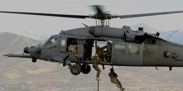 U.S. Army Soldiers from the 19th Special Forces, Utah National Guard are lifted on board an Air Force HH-60 Pave Hawk helicopter over the Utah Test and Training Range Nov. 9, 2007, during combat search and rescue (CSAR) integration exercise. The training was given by Airmen from the 34th Weapons Squadron, United States Air Force Weapons School out of Nellis Air Force Base, Nev. The exercise\'s objective was to expand expertise and integration with Utah\'s 211th Aviation Group AH-64 Apache Joint Rotary Wing, 4th Fighter Squadron F-16 Fighting Falcon Striker assets, 19th Special Operations Forces, and conduct extensive joint CSAR operations against surface to air threats. (U.S. Air Force photo by Master Sgt. Kevin J. Gruenwald) <a href="http://www.army.mil">www.army.mil</a>