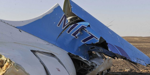 Image released by the Prime Minister's office shows the tail of a Metrojet plane that crashed in Hassana, Egypt