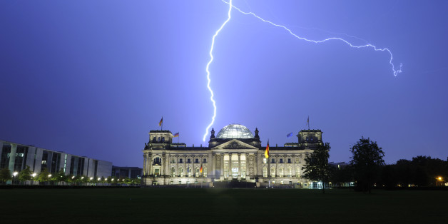 (GERMANY OUT) Germany Berlin Mitte - thunderstorm, Reichstag struck by lightning (Photo by Heerde/ullstein bild via Getty Images)