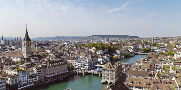 Old Town Zurich view of city with St. Peter's Church clock tower and the Limmat River