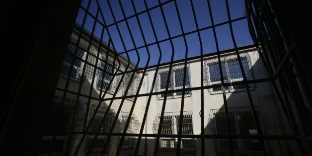 View of a courtyard at a former prison in Drahonice, Czech Republic, Friday, Oct. 2, 2015. Anticipating a possible influx of migrants in the country, the Czech Republic is turning the prison into a new detention center for up to 240 of them. (AP Photo/Petr David Josek)
