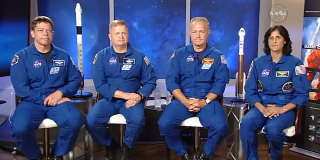 In this image made from video provided by NASA, astronauts, from left, Bob Behnken, Eric Boe, Doug Hurley and Suni Williams gather for an interview at the Johnson Space Center in Houston on Friday, July 10, 2015. On Wednesday, NASA announced the four were chosen to fly on the first test flights of commercial spacecraft. (NASA via AP)
