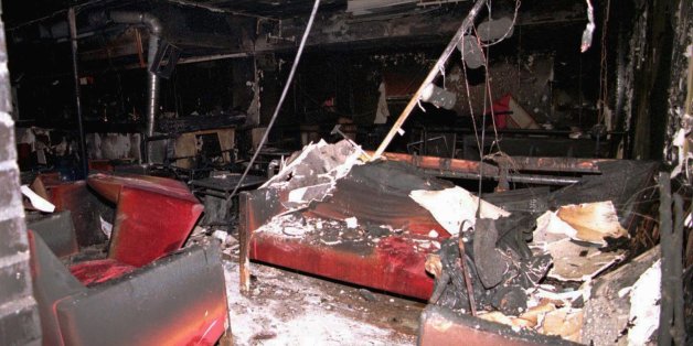 View of the burned sofas inside the topless bar and discotheque Mea Culpa, where three masked men carrying guns burst in, poured gasoline on the floor and set it alight, Wednesday April 16 1997 in Amarante, east of Oporto, northern Portugal. Twelve people were killed and 14 injured. (AP Photo/Francisco Neves) ** PORTUGAL OUT **