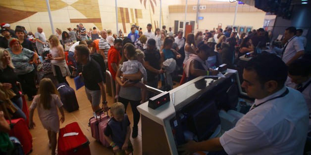 SINAI, EGYPT - NOVEMBER 06: Evacuation of British tourists who were stranded in Sharm el-Sheikh due to security reason regarding the possibility of bomb attack towards crushed Russian passenger plane starts at the International Sharm el-Sheikh Airport in Sharm el-Sheikh, Sinai, Egypt on November 06, 2015. (Photo by Stringer/Anadolu Agency/Getty Images)