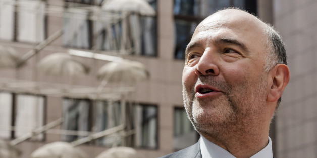 European Commissioner for the Economy Pierre Moscovici speaks with the media as he arrives for a meeting of the eurogroup finance ministers at the EU Council building in Brussels on Monday, May 11, 2015. Hopes for a deal between Greece and its European creditors at a key meeting Monday are slim, weighing on the region's stock markets as the country struggles to make upcoming debt repayments. (AP Photo/Geert Vanden Wijngaert)