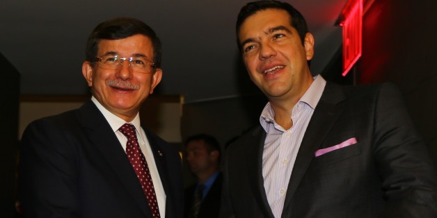 NEW YORK, USA - SEPTEMBER 29: Turkish Prime Minister Ahmet Davutoglu (L) and Greek Prime Minister Alexis Tsipras (R) hold a meeting in New York, USA on September 29, 2015. (Photo by Hakan Goktepe/Anadolu Agency/Getty Images)