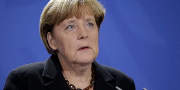 German Chancellor Angela Merkel speaks during a statement on the death of former German Chancellor Helmut Schmidt in Berlin, Germany, Tuesday, Nov. 10, 2015. Schmidt died today in the age of 96 years. (AP Photo/Michael Sohn)