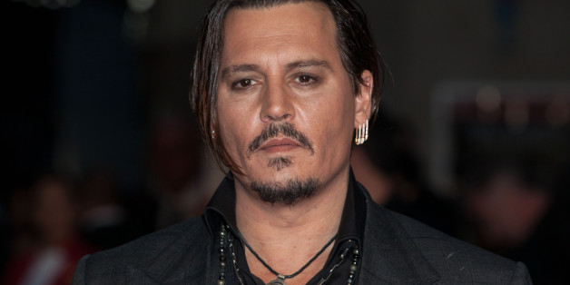 Actor Johnny Depp poses for photographers upon arrival at the Premiere of the film Black Mass, showing as part of the London Film Festival, in central London, Sunday, Oct. 11, 2015. (Photo by Grant Pollard/Invision/AP)