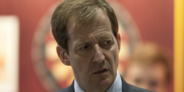 Alastair Campbell, former Director of Communications and Strategy for ex Prime Minister Tony Blair, is seen by the conference hall on the first day of Britain's Conservative Party Conference, Manchester, England, Sunday, Sept. 29, 2013. (AP Photo/Jon Super)