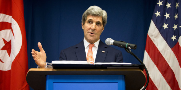 US Secretary of State John Kerry speaks during a news conference at the U.S. Embassy on Tuesday, Feb. 18, 2014, in Tunis. Kerry promised continued American assistance in the North African nationâs battle against terrorists, during his unannounced visit Tuesday. (AP Photo/Evan Vucci)
