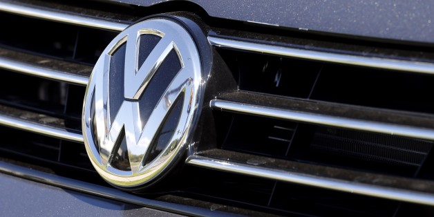 FILE - In this Thursday, Sept. 24, 2015, file photo, the grille of a Volkswagen car for sale is decorated with the iconic company symbol in Boulder, Colo. Germany's Volkswagen, already reeling from news that it had cheated on U.S. tests for nitrogen oxide emissions, said Tuesday, Nov. 3, that an internal investigation had revealed "unexplained inconsistencies" in the carbon dioxide emissions from 800,000 vehicles that could cost the company another 2 billion euros ($2.2 billion). The revelation comes after VW's admission in September that it rigged emissions tests for four-cylinder diesel engines on 11 million cars worldwide, including almost 500,000 in the U.S. It has already set aside 6.7 billion euros ($7.4 billion) to cover the costs of recalling those vehicles. (AP Photo/Brennan Linsley, File)