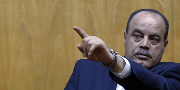 CORRECTING NAME OF TUNISIAN INTERIOR MINISTER TO MOHAMED NAJEM GHARSALLI - Tunisian Interior Minister Mohamed Najem Gharsalli gestures during a press conference in Imperial Marhaba hotel in Sousse, Tunisia, Monday, June 29, 2015, the scene of Friday's beach massacre. The top security officials of Britain, France, Germany and Belgium are paying homage to the people killed in the beach terrorist attack on Friday. (AP Photo/Darko Vojinovic)