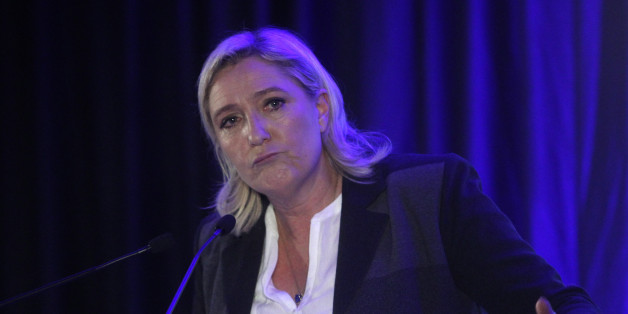 President of France's far right National Front party Marine Le Pen, delivers her speech during a meeting in Wattrelos, northern France, Friday, Nov. 6, 2015. Popular French far right leader Marine Le France is voting in regional elections next month in which the far right National Front is hoping to increase its political power, in part by capitalizing on tensions over waves of migrants in Europe this year. The first round of the regional elections will take place on Dec. 6, 2015. (AP Photo/Michel Spingler)