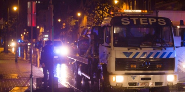 Un raid de la police belge dans le quartier de Molenbeek à Bruxelles, en lien avec les attentats de Paris le 14 novembre 2015