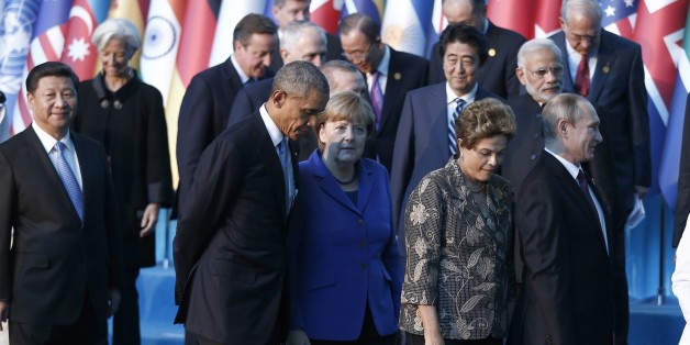 ANTALYA, TURKEY - NOVEMBER 15: (Front row L-R) Chinese President Xi Jinping, US President Barack Obama, German Chancellor Angela Merkel, Brazilian President Dilma Rousseff and Russian President Vladimir Putin arrive for a family photo during the G20 Turkey Leaders Summit on November 15, 2015 in Antalya, Turkey. (Photo by Aykut Unlupinar/Anadolu Agency/Getty Images)