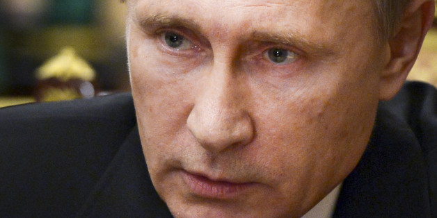 Russian President Vladimir Putin speaks as he heads a meeting on the Russian plane crash in Egypt, in Moscow's Kremlin, Russia, early Tuesday, Nov. 17, 2015. The head of Russia's FSB security service says the crash of the passenger plane in Egypt was the result of a 'terrorist' act. Alexander Bortnikov told Putin on Tuesday that a homemade explosive device blew up on the plane. All 224 people on board the plane, most of them Russian tourists, were killed in the Oct. 31 crash. (Alexei Nikolsky/SP