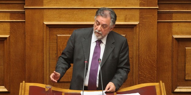ATHENS, GREECE - FEBRUARY 09: Greek Deputy Minister of Citizen Protection Giannis Panousis speaks during the debates about the government's policy, declared by Prime Minister Alexis Tsipras on February 08, at the Greek parliament in Athens, Greece on February 09, 2015. (Photo by Ayhan Mehmet/Anadolu Agency/Getty Images)