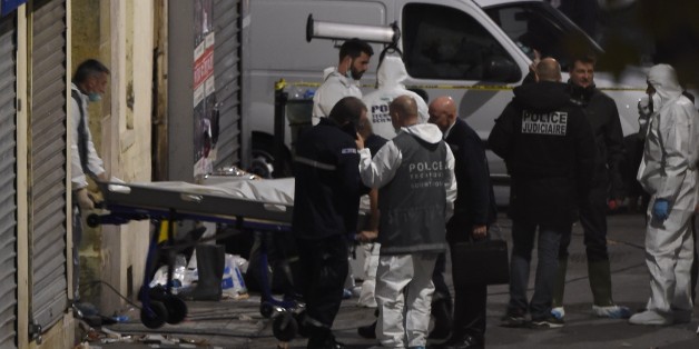 A second body is removed from the apartment raided by French Police special forces earlier in the northern Paris suburb of Saint-Denis, on November 18, 2015, hunting those behind the attacks that claimed 129 lives in the French capital five days ago. French police said the assault had concluded on an apartment in northern Paris in which at least two jihadists were killed and seven arrested. AFP PHOTO / ERIC FEFERBERG (Photo credit should read ERIC FEFERBERG/AFP/Getty Images)