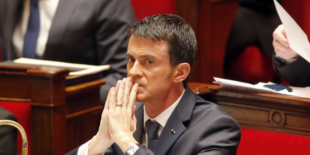 French Prime Minister Manuel Valls is concentrated after he addressed the parliament at the national assembly in Paris, Thursday Nov.19,2015. Valls is warning that the associates of extremists who targeted France last week could use chemical and biological weapons, as he urged Parliament to extend a state of emergency. (AP Photo/Michel Euler)