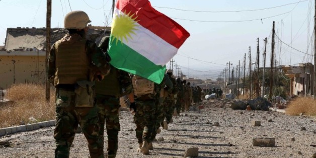 Des forces peshmerga et des combattants yazidis reprennent la ville de Sinjar, en Irak, le 13 novembre 2015