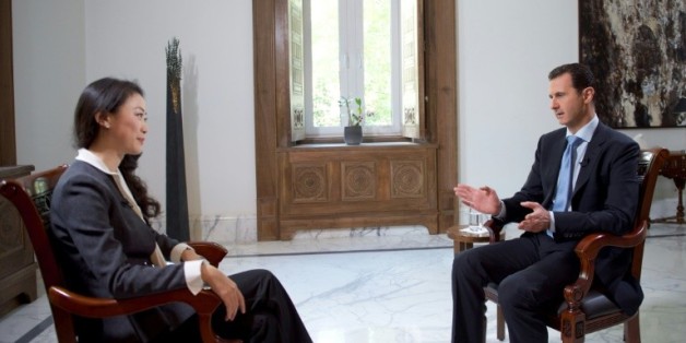 Le président Bachar al-Assad lors d'une interveiw avec la chaîne chinoise de télévision Phoenix, le 22 novembre 2015 à Damas