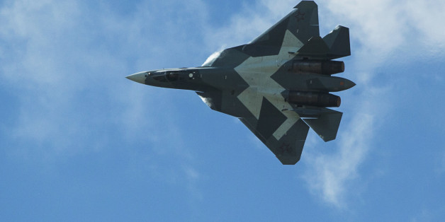 Russian Sukhoi T-50 fighter jet performs during the MAKS-2015 International Aviation and Space Show in Zhukovsky, outside Moscow, Russia, Sunday, Aug. 30, 2015. (AP Photo/Pavel Golovkin)