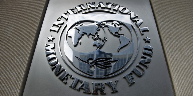 A logo is seen outside the headquarters of the International Monetary Fund June 30, 2015 in Washington, DC. AFP PHOTO/BRENDAN SMIALOWSKI (Photo credit should read BRENDAN SMIALOWSKI/AFP/Getty Images)