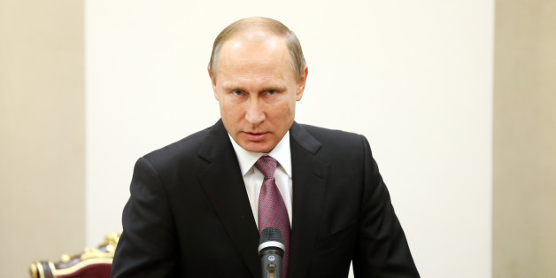Russian President Vladimir Putin speaks with media in a joint press conference with his Iranian counterpart Hassan Rouhani, after signing documents during the Gas Exporting Countries Forum (GECF) in Tehran, Iran, Monday, Nov. 23, 2015. The meeting of the Gas Exporting Countries Forum (GECF) bring major producers such as Russia, Qatar and Algeria to Iran, which itself is the world's third largest producer after the U.S. and Russia. (AP Photo/Ebrahim Noroozi)