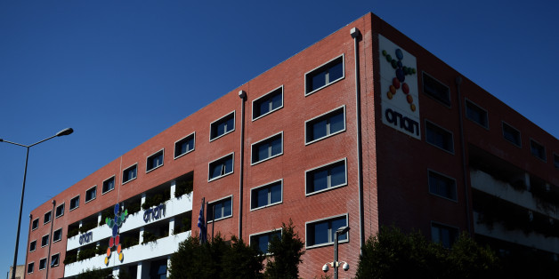 A view of the OPAP building, Greece's state lottery monopoly in Athens on September 21, 2012. Greece on September 19 scrapped tax perks for state-controlled betting agency Opap, which is among the companies to be privatised under a deal with the country's international lenders. Opap, which used to operate tax-free, would now have to pay taxes at a rate of '30 to 35 percent on gross profits until 2020', the finance ministry said in a statement. AFP PHOTO / ARIS MESSINIS (Photo credit shoul
