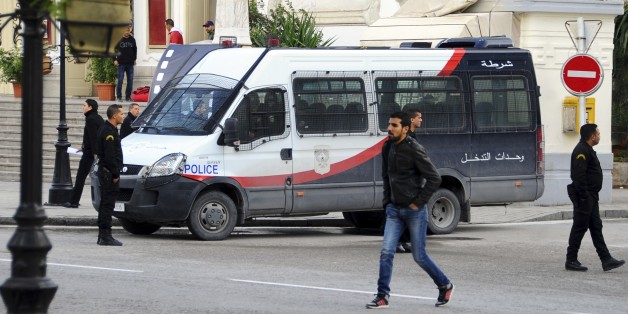 A police van parks in downtown Tunis, Thursday, Nov. 26, 2015. Tunisian authorities have identified a suicide bomber who targeted presidential guards in a deadly attack, saying he was a 27-year-old local street vendor. The Islamic State group claimed responsibility for Tuesday's attack on a bus in central Tunis, which left 12 dead plus the attacker. (AP Photo/Hassene Dridi)