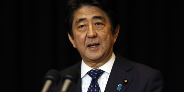 Japanese Prime Minister Shinzo Abe speaks during a press conference in Kuala Lumpur, Malaysia, Sunday, Nov. 22, 2015. (AP Photo/Lai Seng Sin)