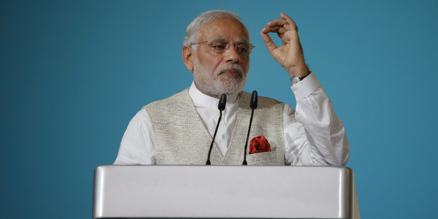 Indian Prime Minister Narendra Modi delivers the 37th Singapore Lecture Monday, Nov. 23, 2015, in Singapore as he starts his two-day official visit to the city-state. (AP Photo/Wong Maye-E)