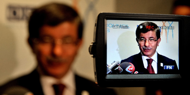 Turkish Foreign Minister Ahmet Davutoglou speaks to the press after his bilateral meeting with Greek Prime Minister George Papandreou at the 17th Organization for Security and Cooperation in Europe (OSCE) Ministerial Council meeting in Athens on December 2, 2009. Foreign ministers from Russia, EU states and central Asia are meeting in Athens to discuss the future of European security ahead of a planned OSCE security summit in Kazakhstan next year. AFP PHOTO/ ARIS MESSINIS (Photo credit should read ARIS MESSINIS/AFP/Getty Images)