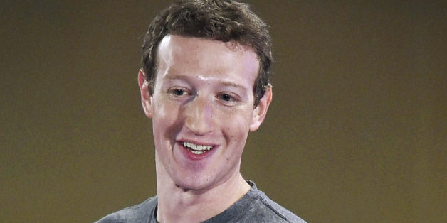 Facebook CEO Mark Zuckerberg interacts with technology students in a town hall-style meeting in New Delhi, India, Wednesday, Oct. 28, 2015. Zuckerberg defended his companyâs contentious efforts to expand Internet access in the developing world during his second visit to India this year. (Shirish Shete/Press Trust of India via AP) INDIA OUT