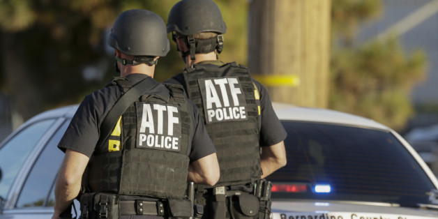 Authorities search an area near where police stopped a suspected vehicle in San Bernardino, Calif., Wednesday, Dec. 2, 2015, following a shooting that killed multiple people at a social services center for the disabled. (AP Photo/Damian Dovarganes)