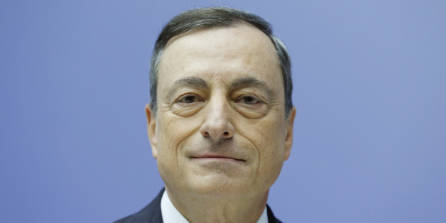 The President of the European Central Bank Mario Draghi waits for the beginning of a news conference following a meeting of the governing council in Frankfurt, Germany, Thursday, Dec. 3, 2015. (AP Photo/Michael Probst)