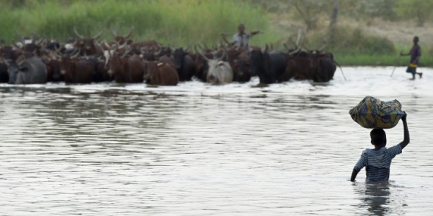 Des villageois au bord du lac Tchad le 11 mars 2015