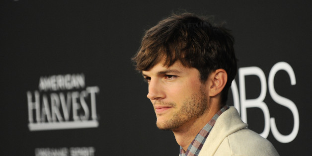 Ashton Kutcher arrives at the special screening of "Jobs" at the Regal Cinemas L.A. Live on Tuesday, Aug. 13, 2013, in Los Angeles. (Photo by Jordan Strauss/Invision/AP)