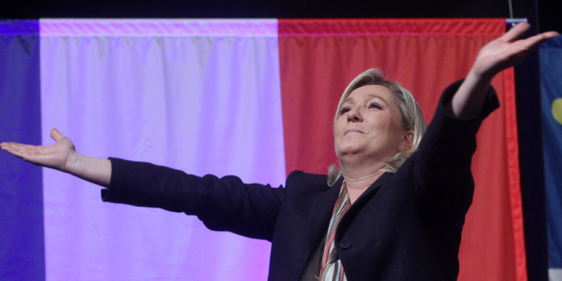 French far-right party leader Marine Le Pen gestures before a meeting in Lille, northern France, Monday, Nov. 30, 2015. France is voting in regional elections Sunday for the first round in which the far right National Front is hoping to increase its political power. The second round of the regional elections will take place on Dec. 13, 2015. (AP Photo/Michel Spingler)