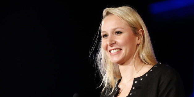 Far right National Front party regional leader for southeastern France, Marion Marechal Le Pen, is seen during a meeting in Nice, southeastern France , Friday, Nov.27,2015. Regional elections are taking place next month in which the far right National Front is hoping to increase its political power, in part by capitalizing on tensions over waves of migrants in Europe this year. The first round of the regional elections will take place on Dec. 6, 2015. (AP Photo/Lionel Cironneau)