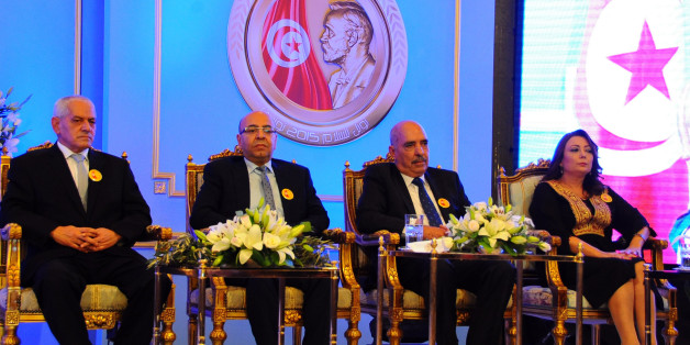 Wided Bouchamaoui president of the Tunisian employers, right, Abdessattar Ben Moussa, president of the Tunisian Human Rights League, second right, Mohamed Fadhel Mafoudh head of the Tunisian Bar Association and Houcine Abassi secretary general of the Tunisian General Labour Union, left, attend a ceremony in Tunis Monday, Nov.9, 2015. The 2015 Nobel Peace Prize went to the Tunisian National Dialogue Quartet who steered Tunisia away from civil war and toward democracy after its 2011 revolution. (A