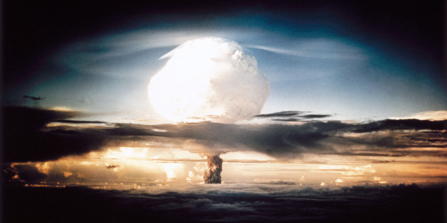 The mushroom cloud produced by the first explosion by the Americans of a hydrogen bomb at Eniwetok Atoll in the South Pacific. Known as Operation Ivy, this test represented a major step forwards in terms of the destructive power achievable with atomic weapons. The hydrogen, or fusion, bomb used a fission device similar to those dropped on Hiroshima and Nagasaki at the end of World War II, detonated inside a container containing deuterium. The high temperatures invol