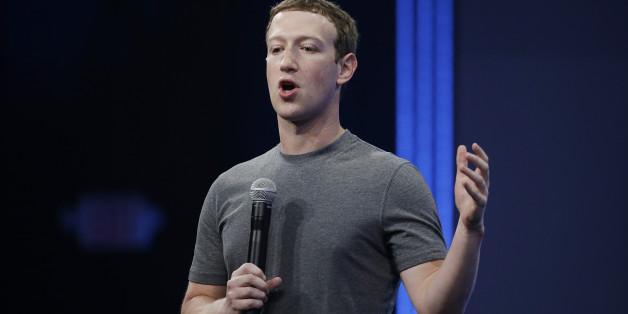 CEO Mark Zuckerberg gestures while talking about the Messenger app during the Facebook F8 Developer Conference Wednesday, March 25, 2015, in San Francisco. Facebook is trying to mold its Messenger app into a more versatile communications channel as smartphones create new ways for people to connect with friends and businesses beyond the walls of the company's ubiquitous social network. (AP Photo/Eric Risberg)