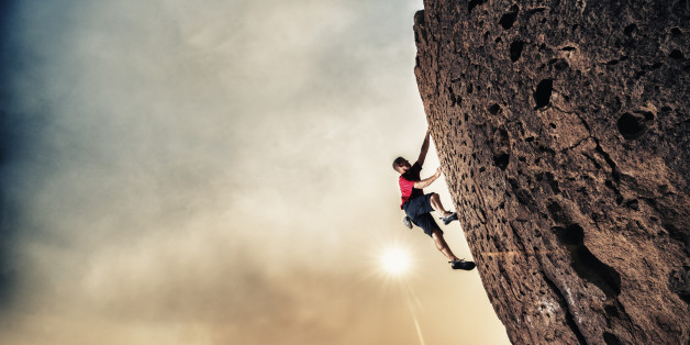 Rock climbing in a dramatic setting