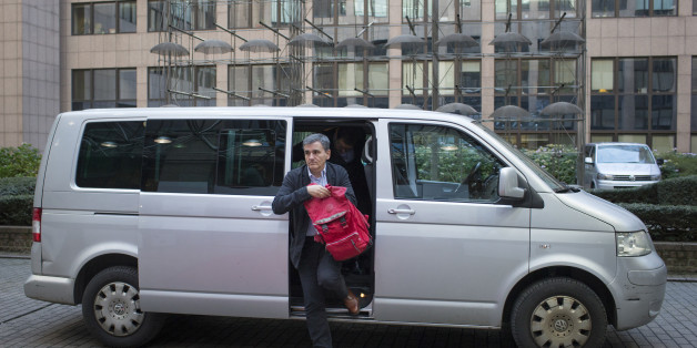 Euclid Tsakalotos, Greece's finance minister, arrives ahead of 2016 draft budget roundtable talks in Brussels, Belgium, on Monday, Nov. 23, 2015. Economic activity in the euro area hit a 4 1/2-year high this month, according to a new report that also pointed to weak price pressures. Photographer: Jasper Juinen/Bloomberg via Getty Images