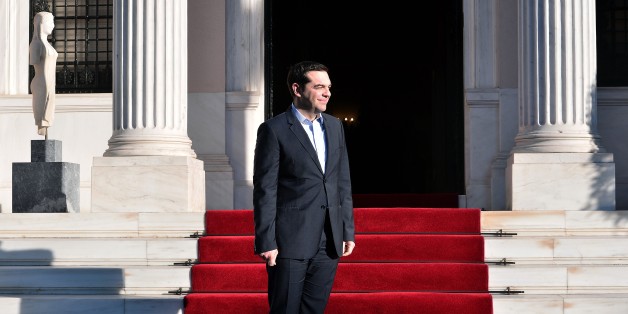 Greek Prime Minister Alexis Tsipras waits for the arrival of Egyptian President Abdel Fattah al-Sissi prior to their meeting in Athens on December 8, 2015.
Sissi started a two-day visit to Greece for talks focused on energy cooperation. / AFP / LOUISA GOULIAMAKI (Photo credit should read LOUISA GOULIAMAKI/AFP/Getty Images)